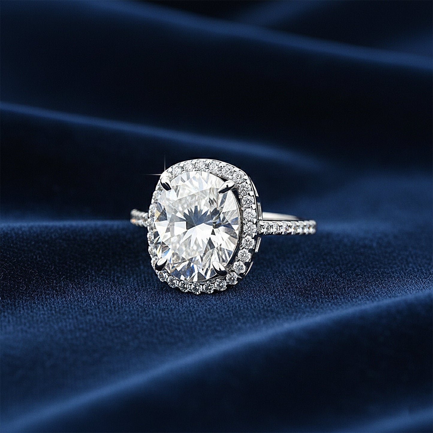 Top view of round brilliant lab diamond ring showing prong setting and fire