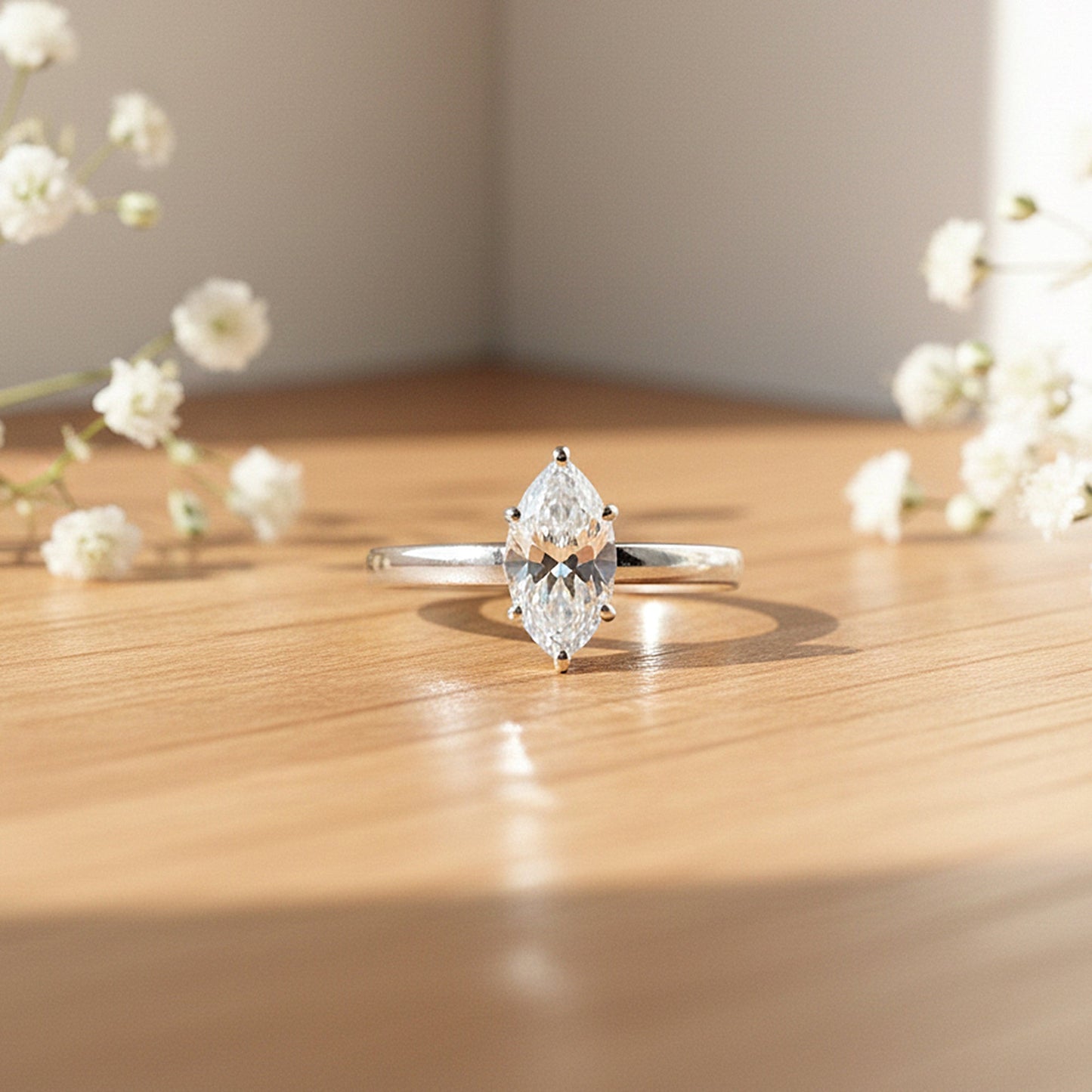 Inner band of 925 sterling silver with 18k gold vermeil on marquise ring