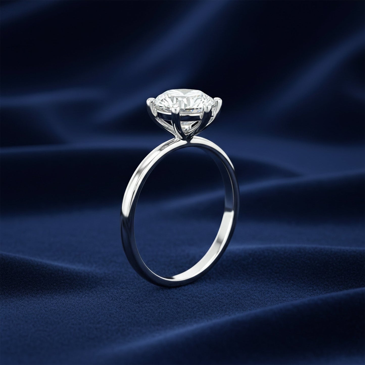 Round lab-grown diamond engagement ring worn on hand, VS1 clarity