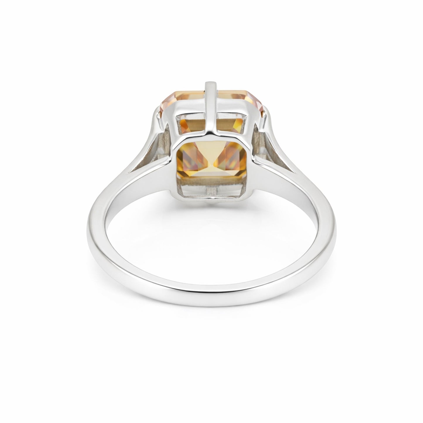 Detail of 18k gold vermeil prongs holding asscher diamond, top-down view
