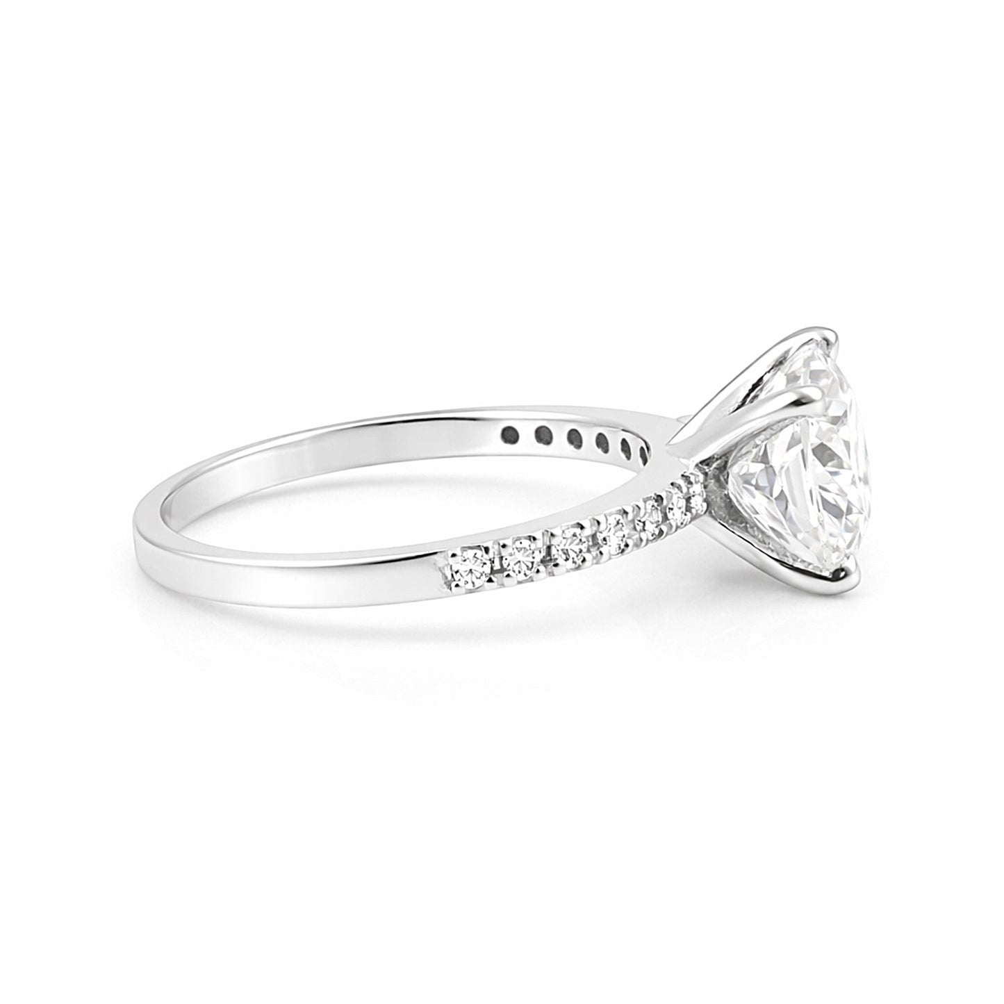 Cushion cut lab diamond ring worn on hand, classic vintage engagement style