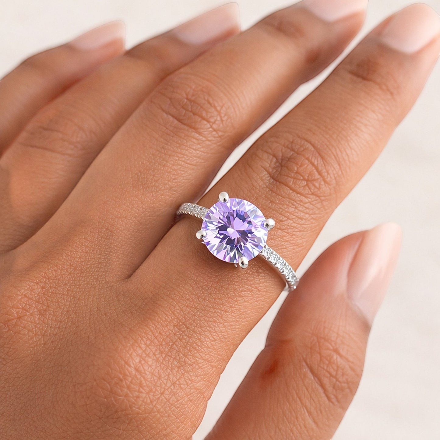GEMHUB & CO. 2.00 Ct round cut blue lab grown diamond ring with VS1 clarity set in 18k gold vermeil on a sterling silver band.