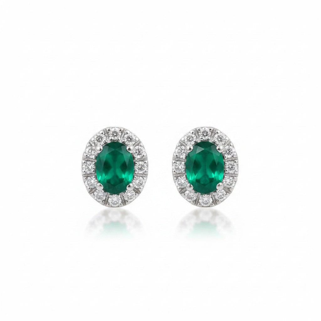 GEMHUB & CO. 10 Ct oval emerald halo stud earrings in 925 sterling silver with white diamond accents.