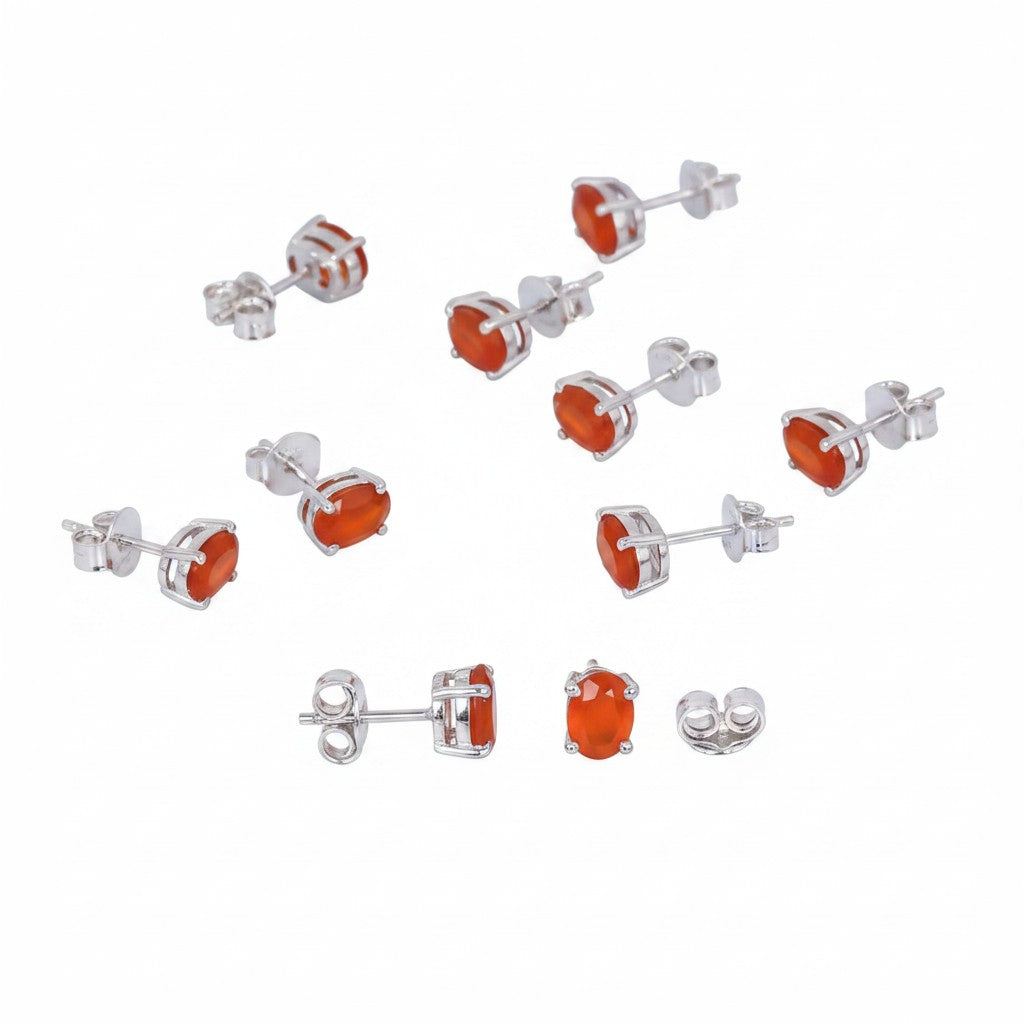 GEMHUB & CO. 5 pairs of oval orange carnelian stud earrings in 925 sterling silver.