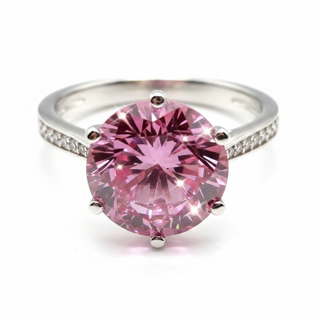 GEMHUB & CO. 2.55ct pink moissanite solitaire ring in 18K gold plated sterling silver with pavé band.
