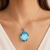 135 ct Natural Blue Topaz Oval Pendant in 925 Sterling Silver – side view