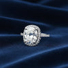 Top view of round brilliant lab diamond ring showing prong setting and fire