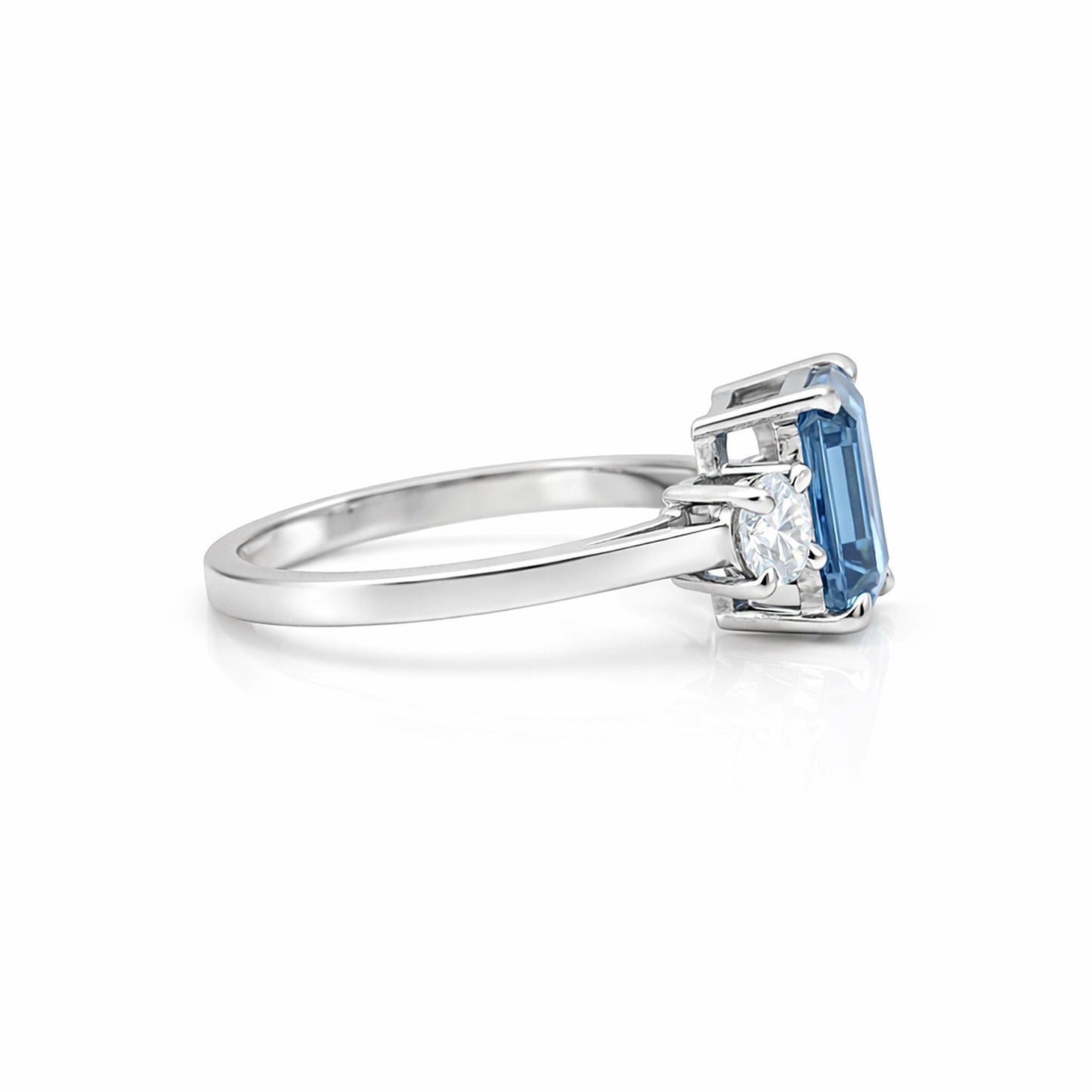 Fancy blue cushion lab diamond ring worn on hand, statement engagement style