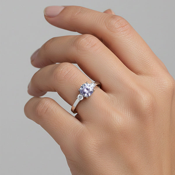 Side profile of 2.6ct blue emerald diamond ring on gold vermeil east-west prongs