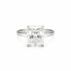 Emerald cut lab diamond ring worn on hand, art deco engagement styling