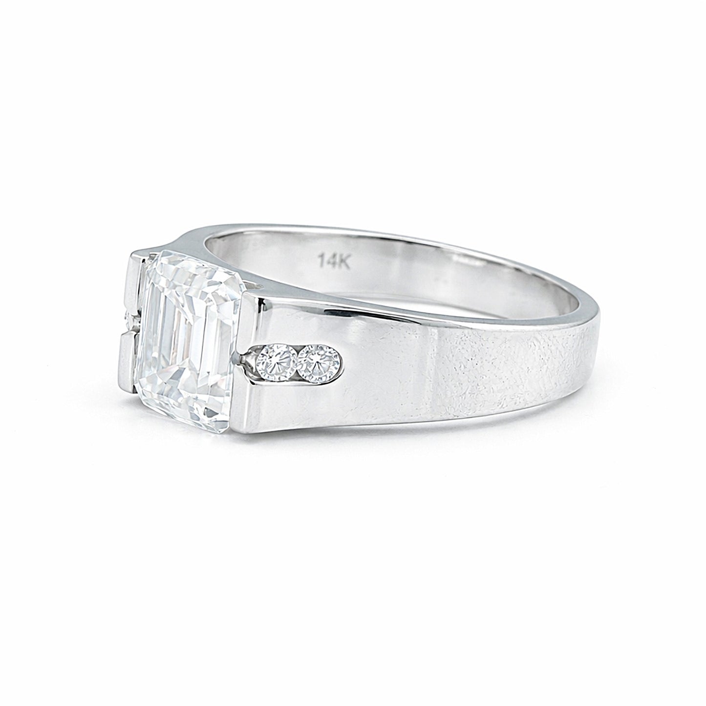 Emerald cut lab diamond ring worn on hand, art deco engagement styling