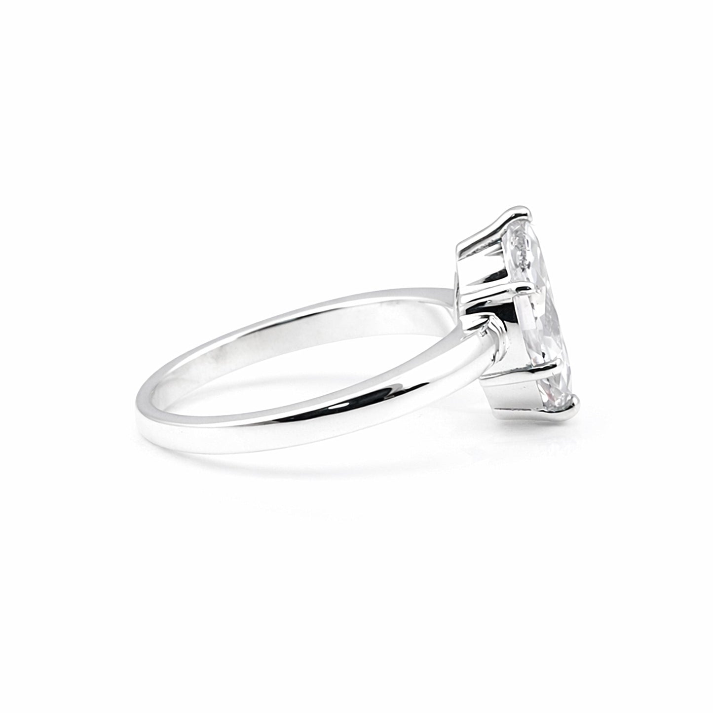 Marquise lab diamond ring worn on hand, elongating finger styling
