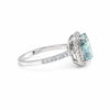 Fancy blue 4.4ct emerald lab diamond ring worn on hand, cocktail-ring scale
