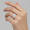 Asscher cut lab diamond ring worn on hand, art deco engagement styling