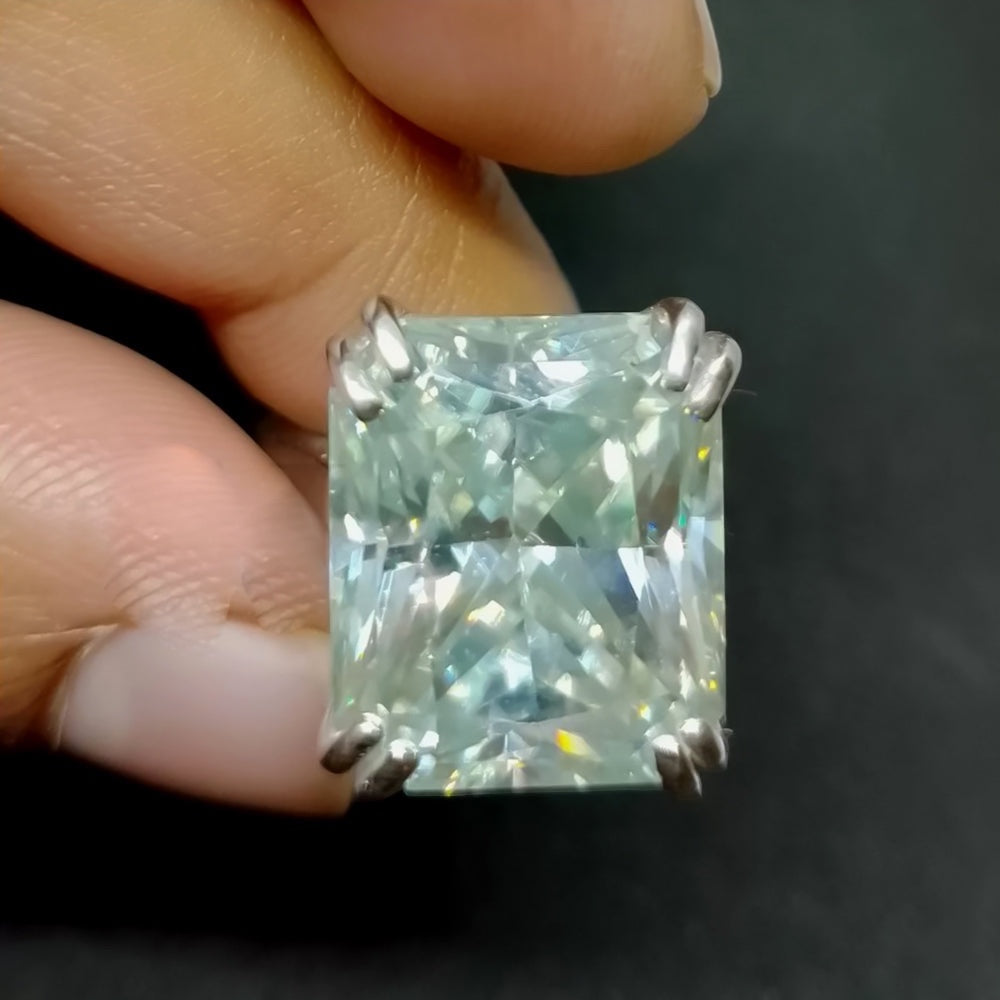 Side profile of 9.45ct moissanite ring with cathedral-style gold vermeil shoulders
