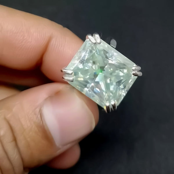 Moissanite solitaire ring on hand, demonstrating statement size and finger fit