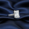 Detail of 18k gold vermeil four-prong setting holding 10ct emerald diamond