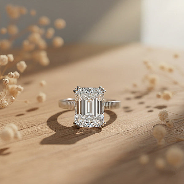 Side profile of 10ct emerald diamond ring with gold vermeil east-west prongs