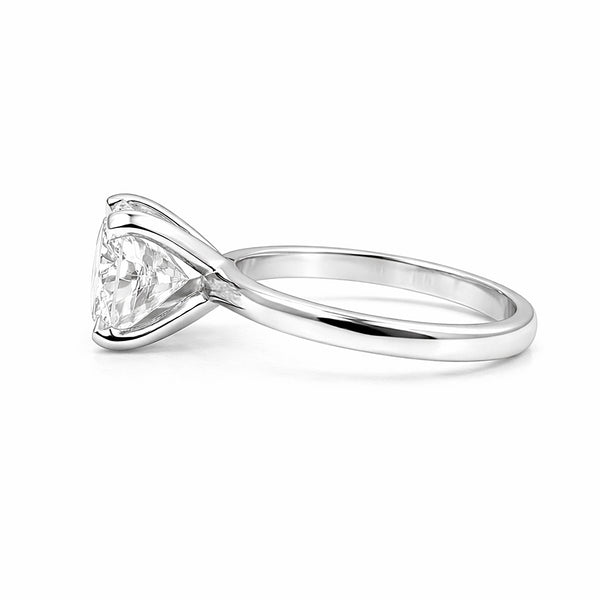 Cushion cut lab diamond ring worn on hand, vintage-inspired engagement style