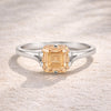 Side profile of champagne diamond ring on gold vermeil four-prong setting