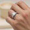 Side profile of 4ct emerald diamond ring with gold vermeil prong setting