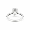 Pear-cut lab diamond ring worn on hand, elongating finger styling