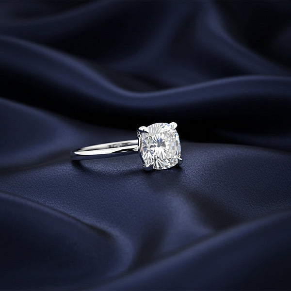 Top view of 2ct cushion diamond showing soft square shape and brilliance