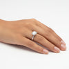 Side profile of cushion engagement ring with gold vermeil cathedral shank