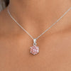 Round-cut pink lab diamond pendant with detailed view of 4-prong vermeil mounting