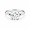 Side profile of round diamond solitaire with cathedral gold vermeil shoulders