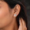 Pair of white topaz earrings displaying brilliant clear sparkle and round cut