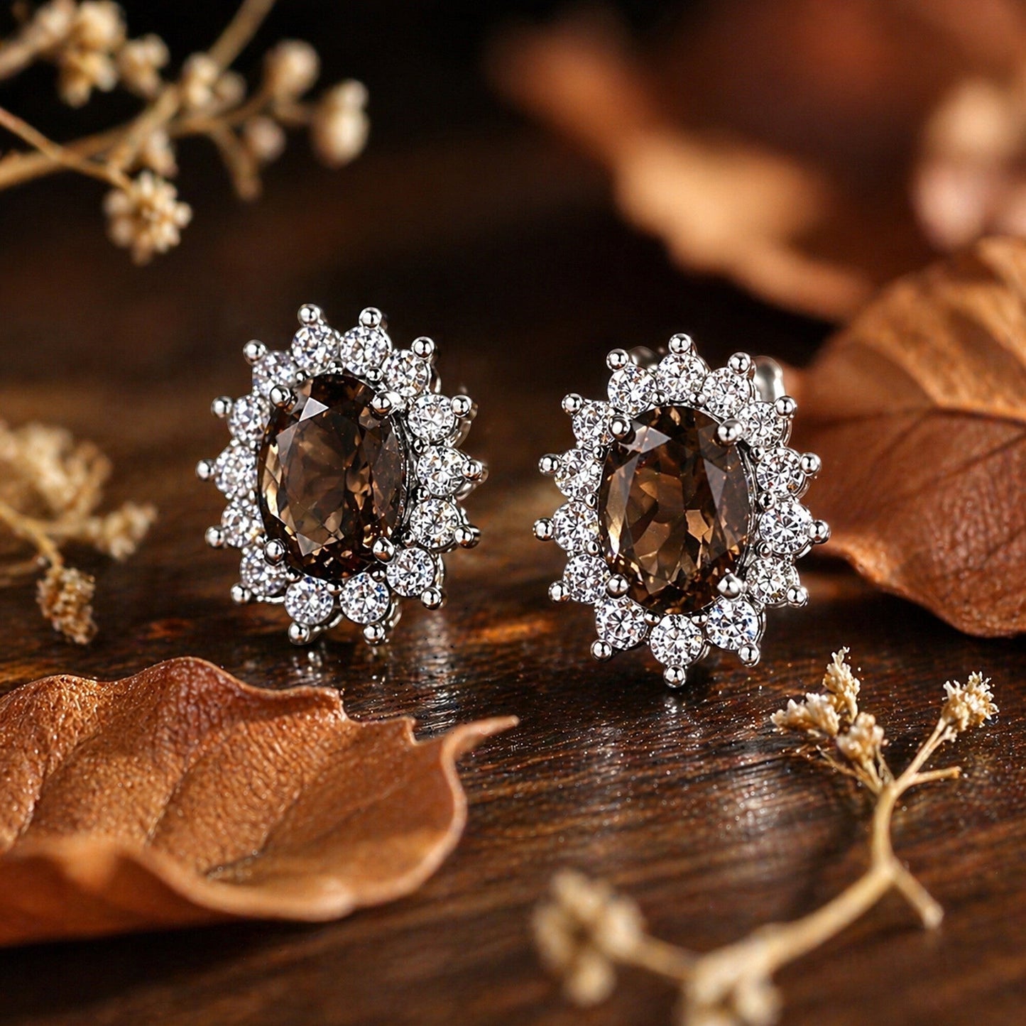 Side angle of smoky topaz earring with bezel-set sterling silver mounting