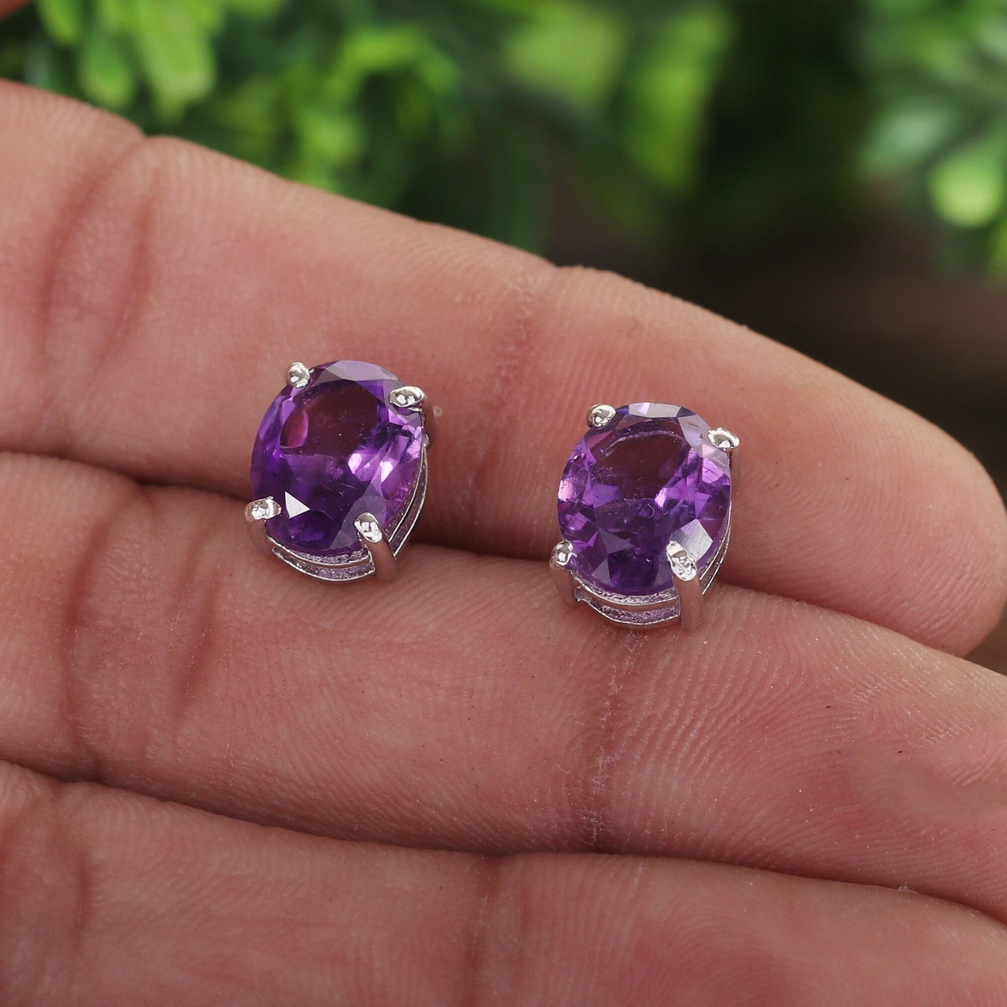 Natural amethyst drop earrings worn on ear, refined everyday styling