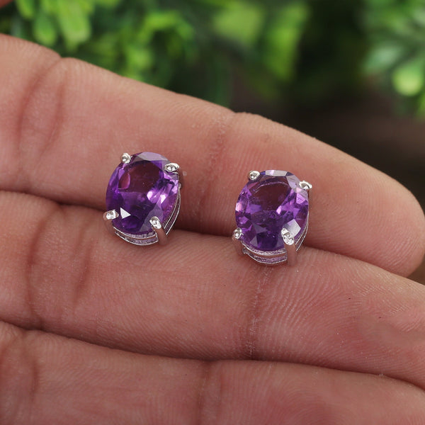 Natural amethyst drop earrings worn on ear, refined everyday styling