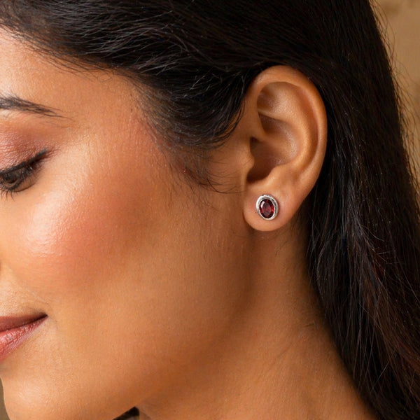 Pair of red garnet drop earrings, oval cut stones with deep wine colour