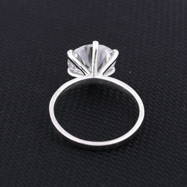 925 sterling silver inner band with 18k gold vermeil finish on solitaire