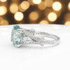 GEMHUB & CO. 5 Ct round cut blue lab grown diamond ring with pear-shaped accent stones in 18k gold vermeil.