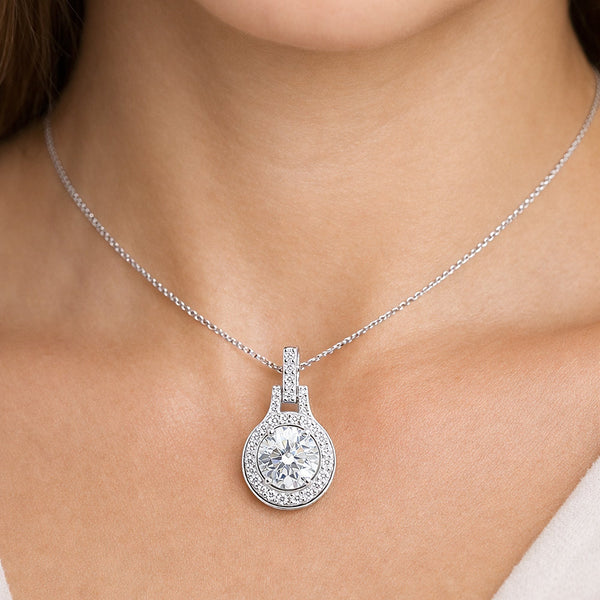 GEMHUB & CO. 2.50 Ct round cut lab grown diamond pendant in 18k gold vermeil with VS1 clarity.