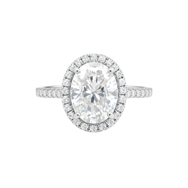 GEMHUB & CO. 3.00 Ct oval cut lab grown diamond ring with VS1 clarity, set in 18k gold vermeil with a diamond halo.