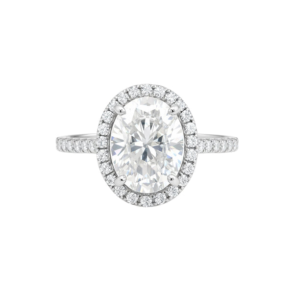 GEMHUB & CO. 3.00 Ct oval cut lab grown diamond ring with VS1 clarity, set in 18k gold vermeil with a diamond halo and band.