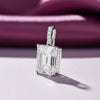 GEMHUB & CO. 4.50 Ct emerald cut lab-grown diamond pendant with VS1 clarity in 18k gold vermeil, accented with small diamonds on the bail.