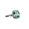 GEMHUB & CO. 5.00 Ct cushion cut blue lab grown diamond ring with VS1 clarity, set in 18k gold vermeil with a halo of small diamonds.