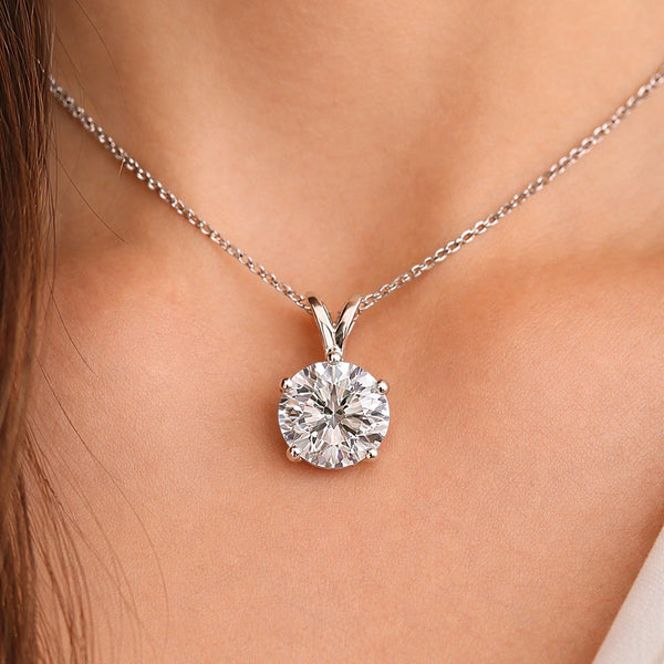 GEMHUB & CO. 6 Ct round cut lab grown diamond pendant in 18k gold vermeil with VS1 clarity.