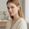 Side profile of 7ct moissanite stud with four-prong gold vermeil setting