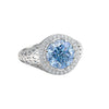 GEMHUB & CO. 3.50 Ct round cut blue lab-grown diamond ring with VS1 clarity, set in 18k gold vermeil with a halo of smaller diamonds.