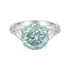 GEMHUB & CO. 5 Ct round cut blue lab grown diamond ring with side pear-cut stones, 18k gold vermeil band with pavé details.