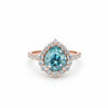 GEMHUB & CO. 4.70 Ct pear cut blue moissanite solitaire ring with halo, set in gold vermeil over sterling silver.