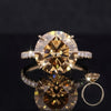 GEMHUB & CO. 10.50 Ct round cut champagne moissanite ring with pave diamond band in gold vermeil.