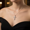 GEMHUB & CO. 3 Ct round cut lab-grown diamond cross pendant in 18k white gold vermeil with VS1 clarity.