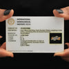 18k yellow gold criss-cross ring shown alongside IGI certificate card